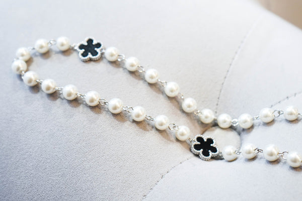 Four Leaf Clover and Pearl Necklace