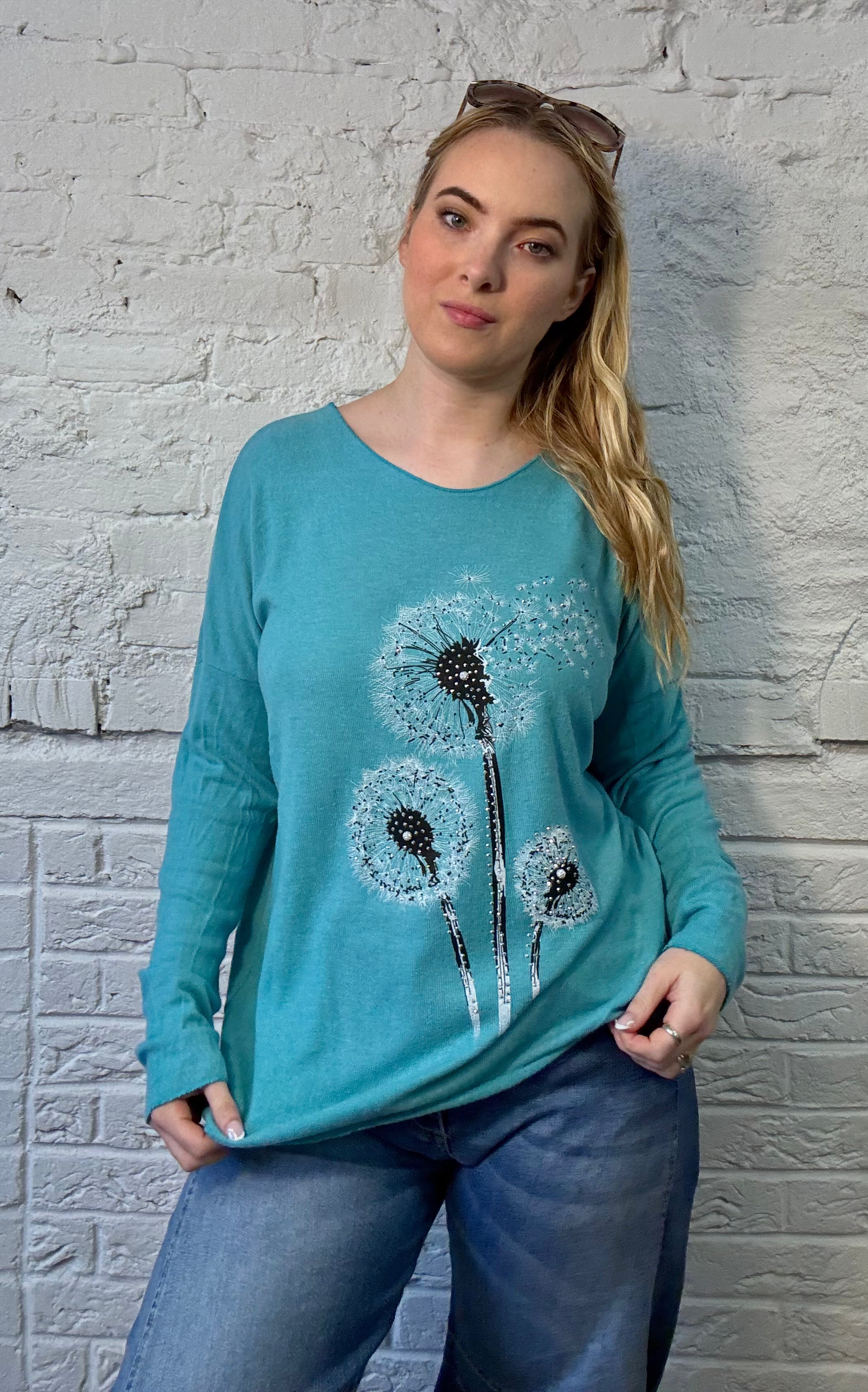 Tejido de punto suave con destellos de diente de león