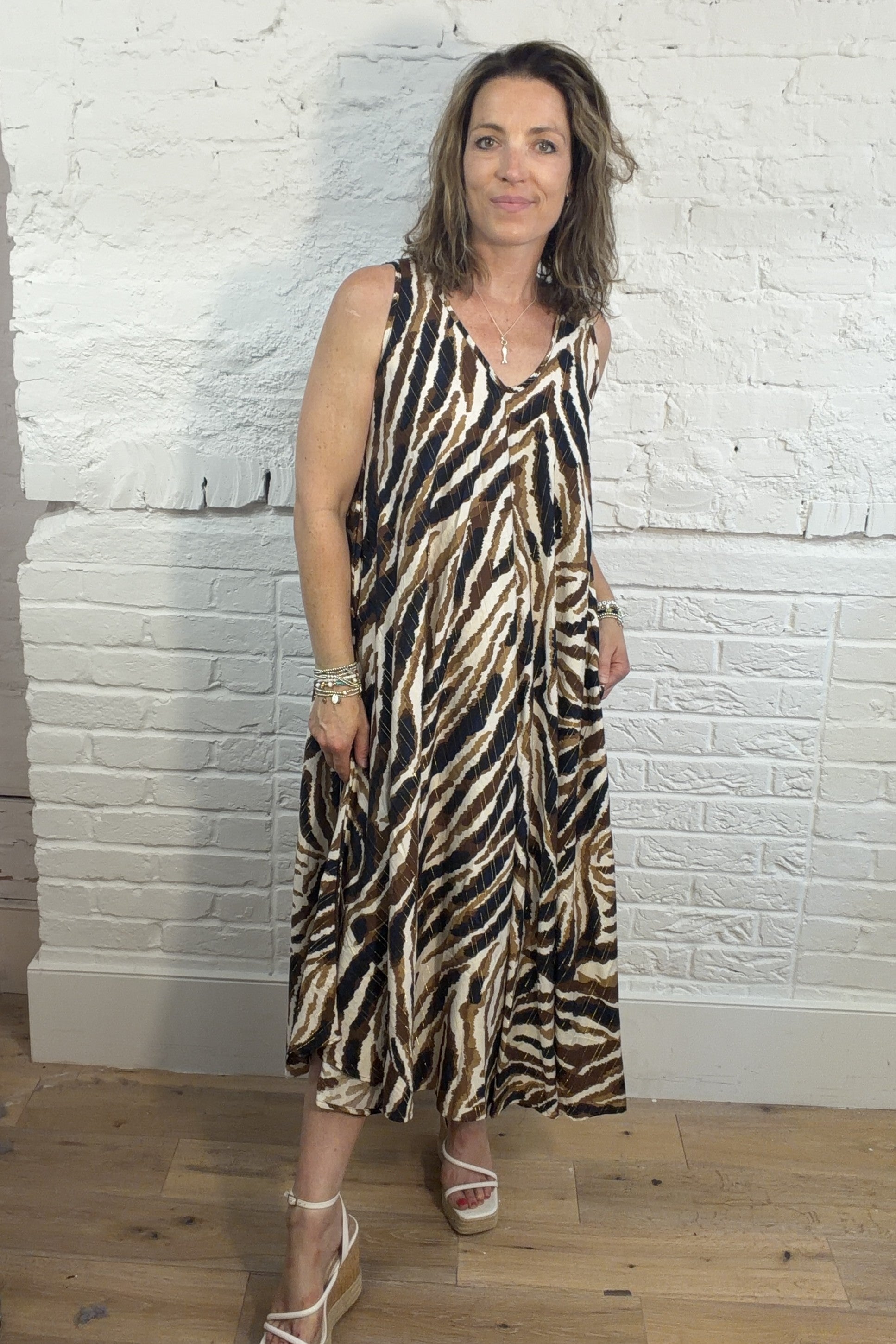 Yara Sleeveless Swing Dress