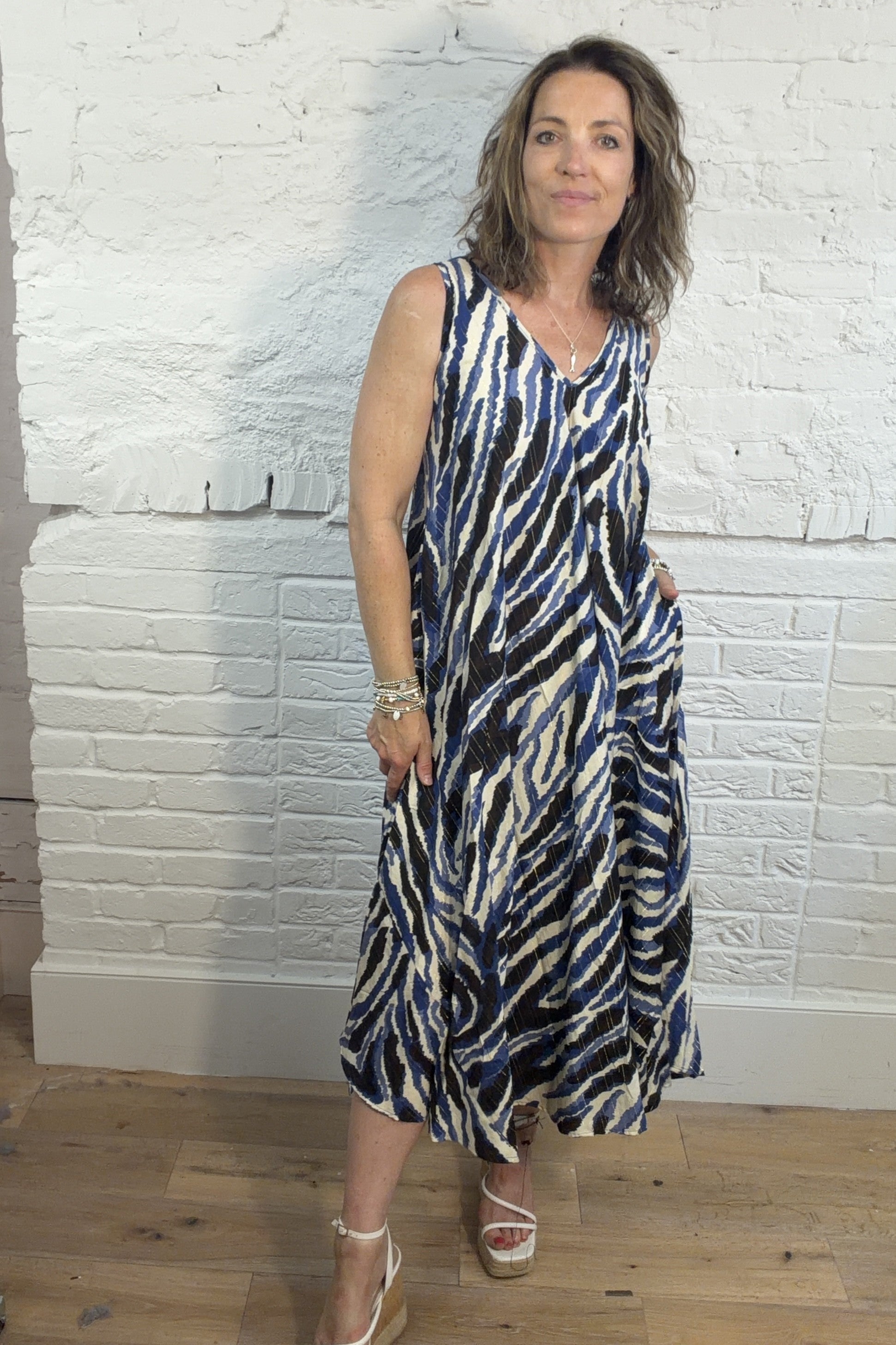 Yara Sleeveless Swing Dress