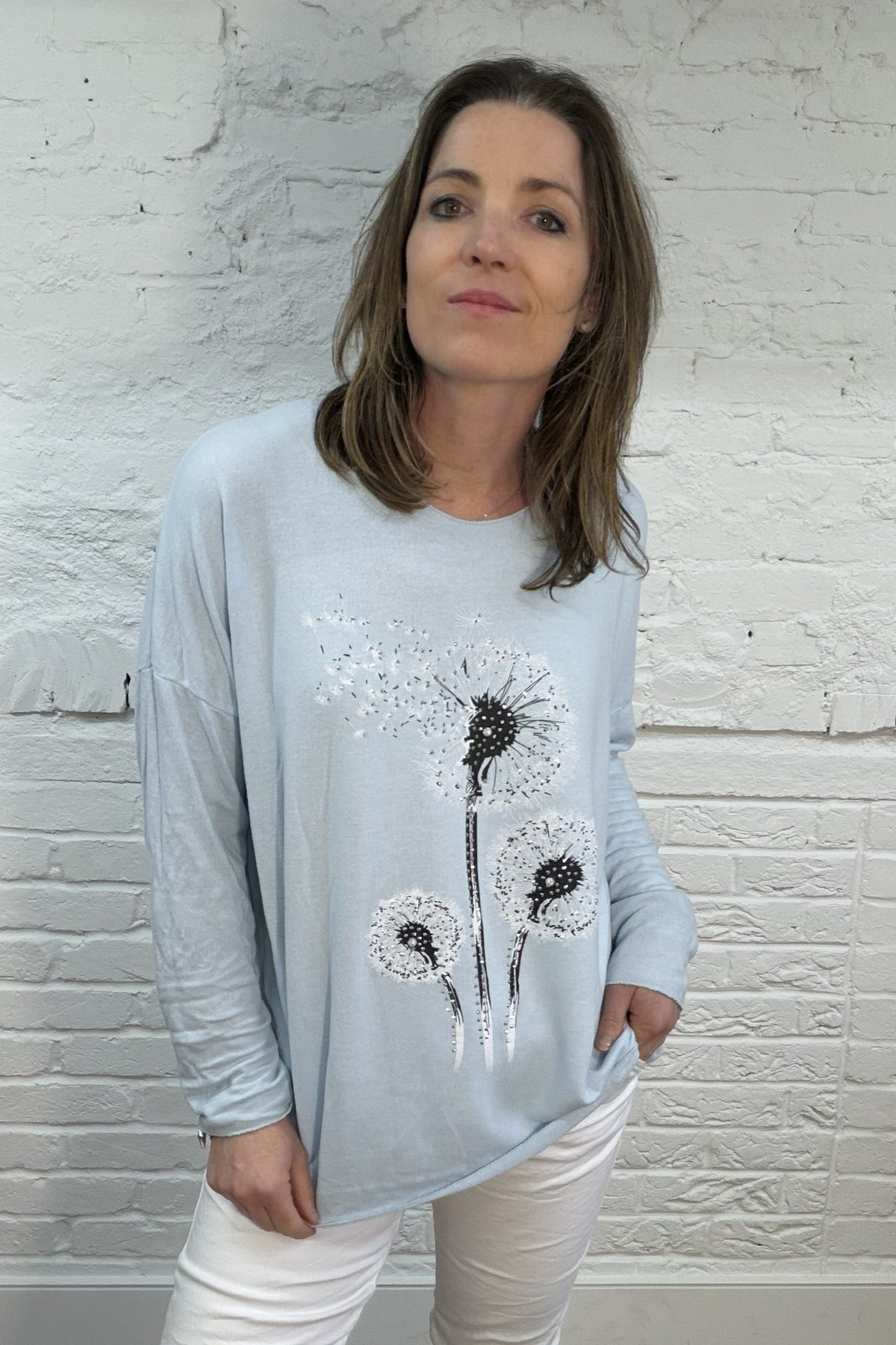 Weicher Strick mit Pusteblumen-Glitzer